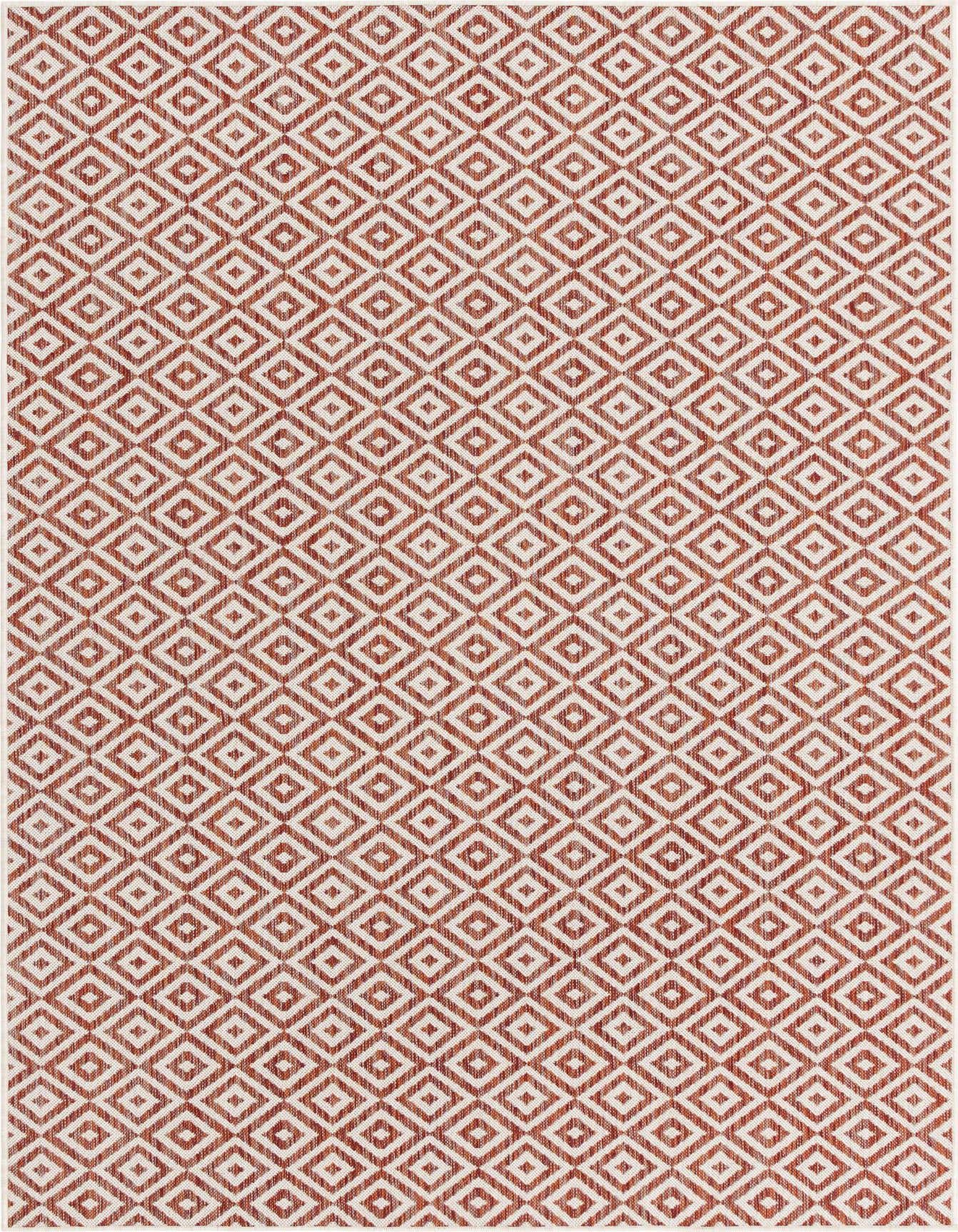 A 6x9 rectangular Jill Zarin Outdoor rug featuring a repeating orange and white geometric trellis pattern, suitable for indoor or outdoor use.
