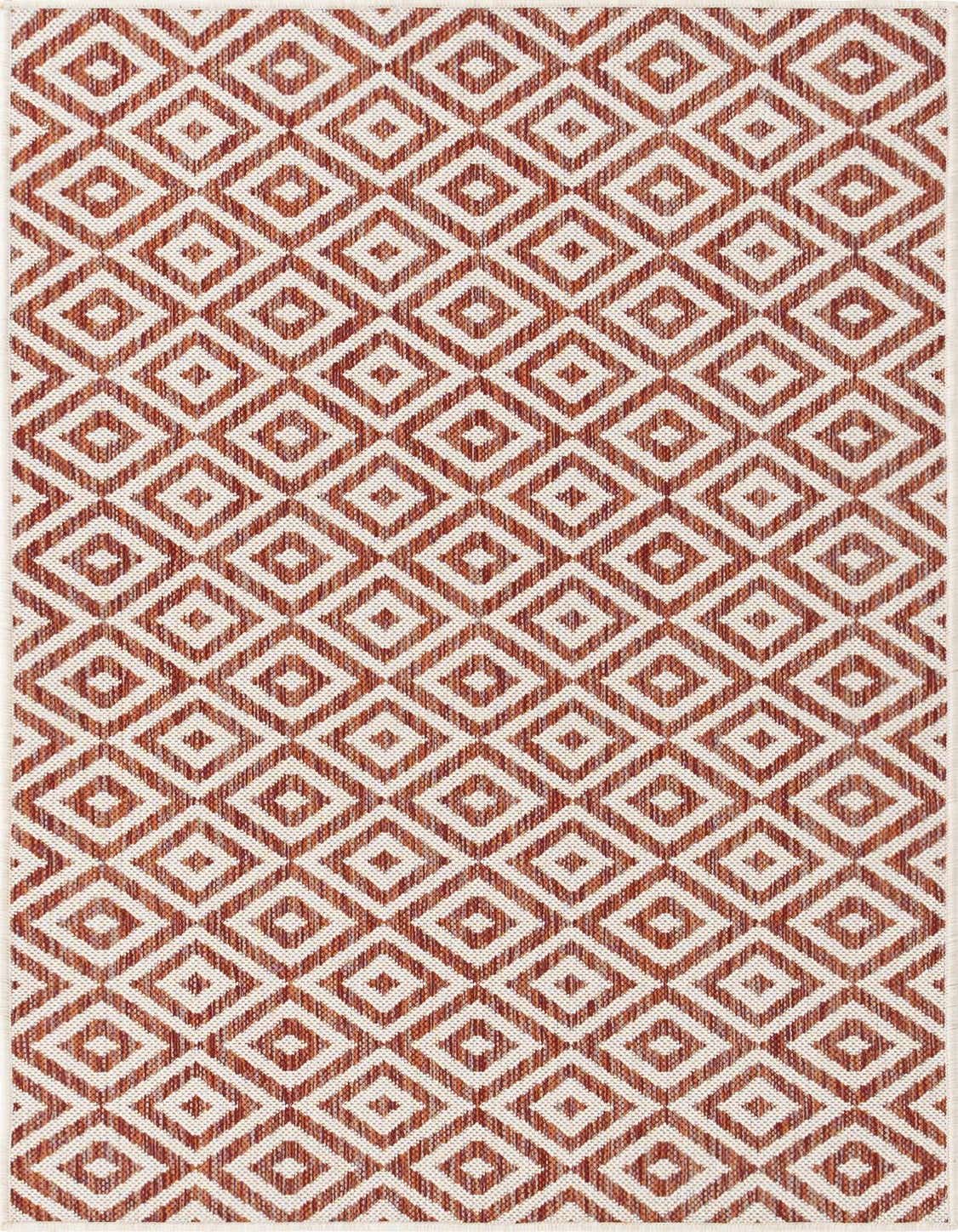 A 3x5 rectangular Jill Zarin Outdoor rug featuring a repeating orange and red Bohemian trellis pattern on a textured flatweave.