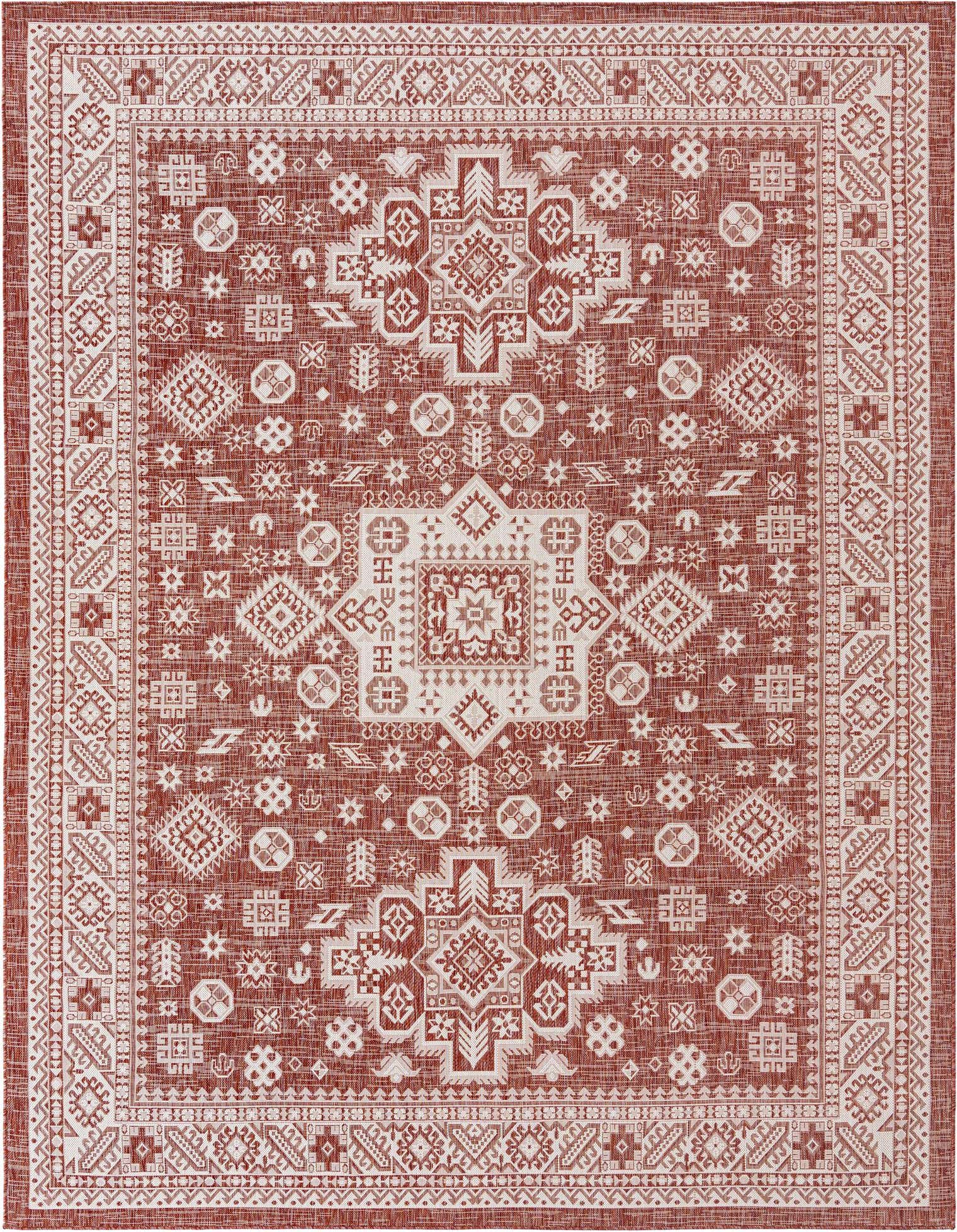 A 9x12 rectangular Southwestern rug in shades of orange and red with intricate tribal patterns and a distinct border.