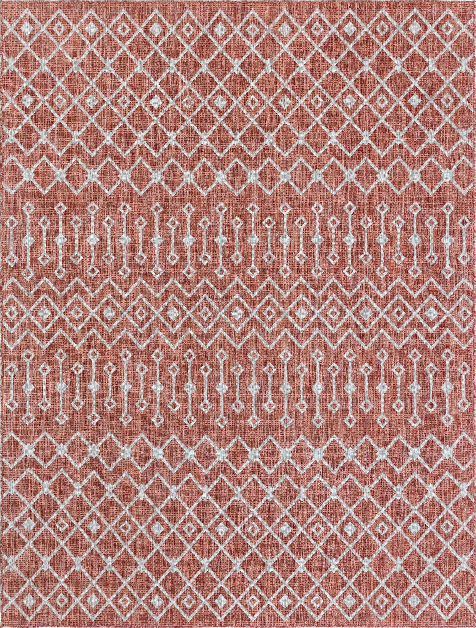 A 9x12 rectangular orange and red tribal patterned rug with white geometric diamonds and lines, suitable for indoor/outdoor use.