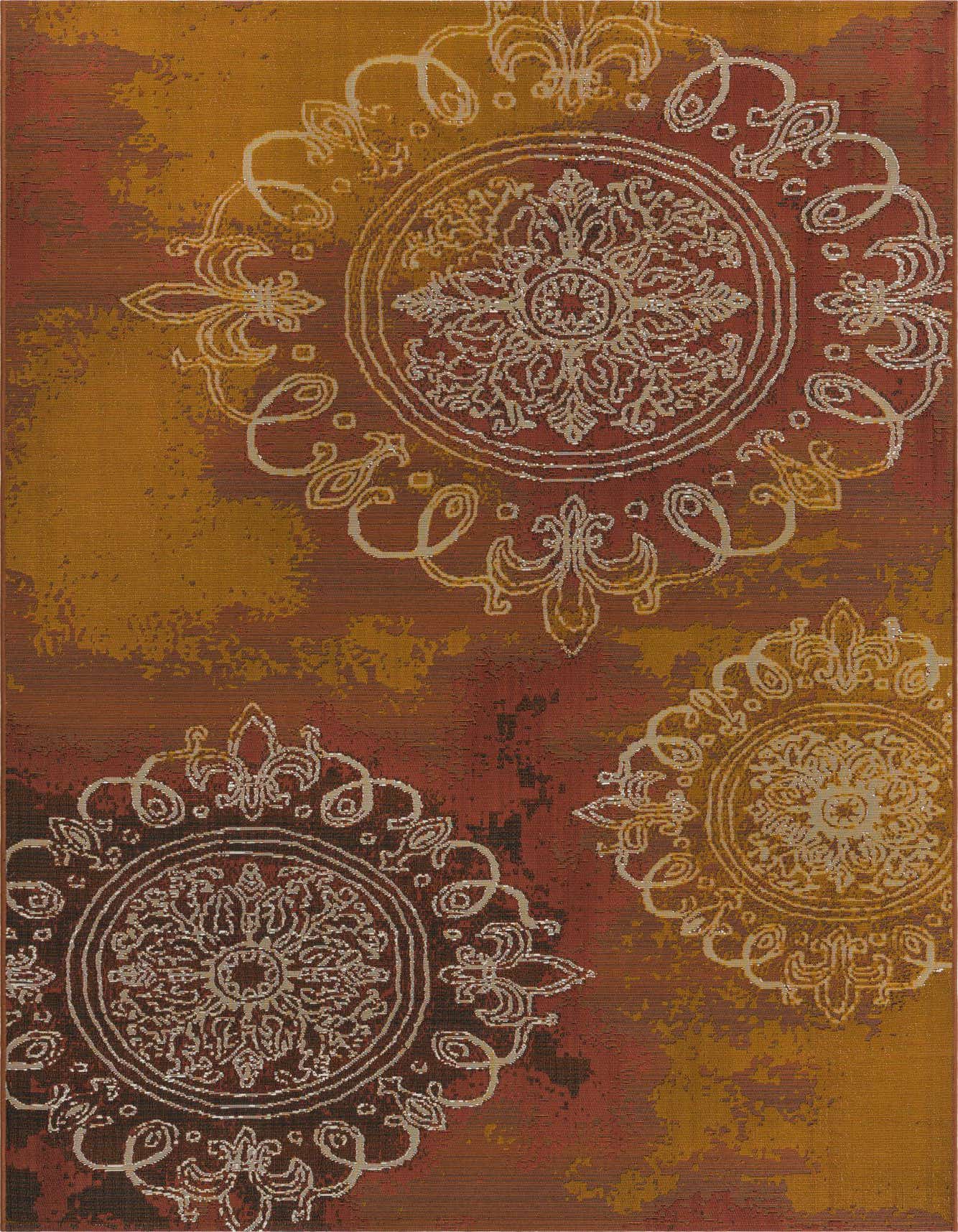 A 5x8 rectangular indoor/outdoor rug featuring large, ornate medallion patterns in cream and gold on a distressed background of oranges and reds.
