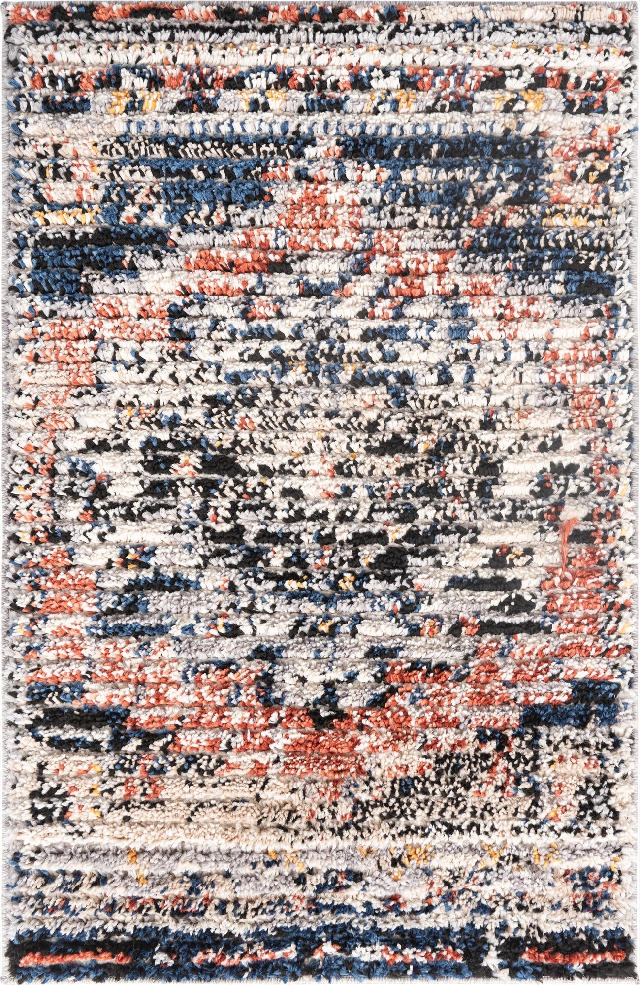 A 2x3 rectangular shag rug featuring a Southwestern-inspired medallion pattern in oranges, reds, blues, and black.