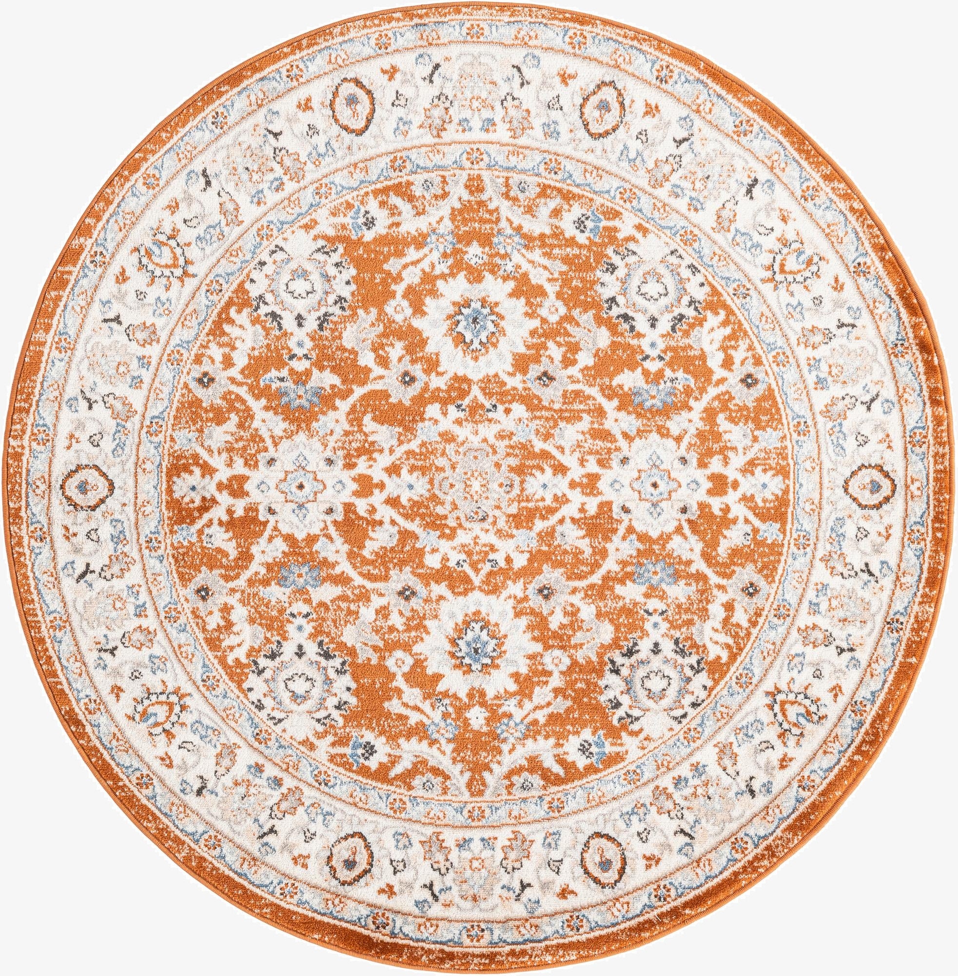 A 5' 3 round orange and white traditional rug with an ornate floral medallion pattern and a thin pile.