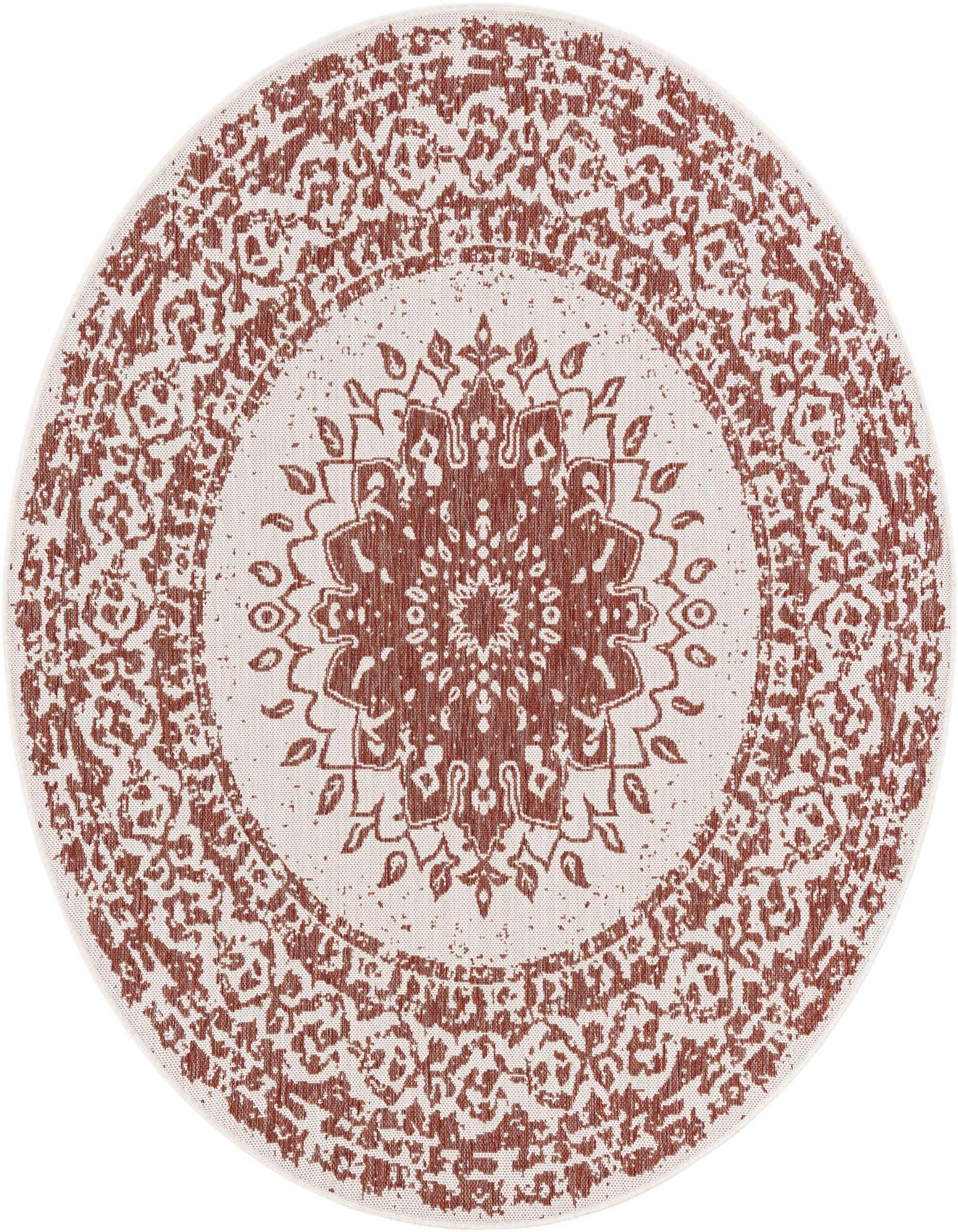 A 6' round orange and cream vintage medallion rug with a flatweave texture, suitable for indoor or outdoor use.