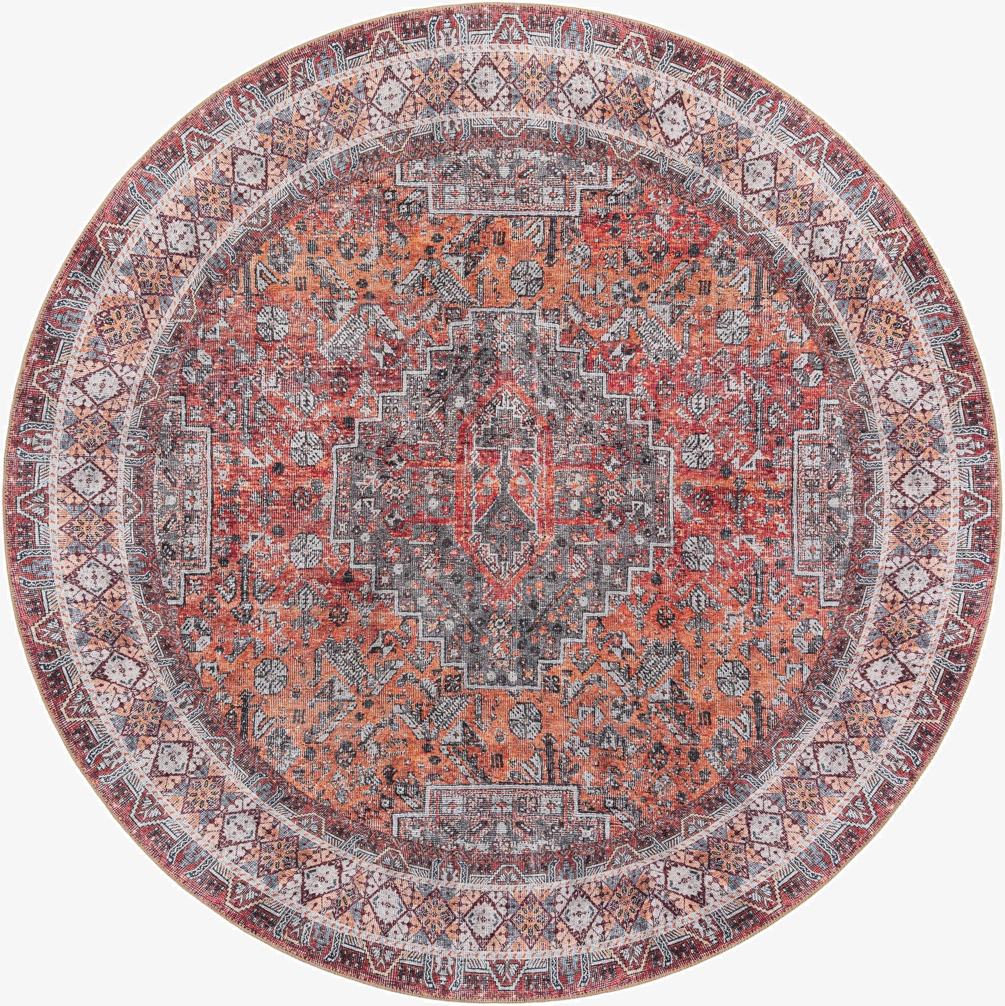A 7' 10 round rug featuring a distressed medallion pattern in oranges, reds, and grays, ideal for a living room or patio.