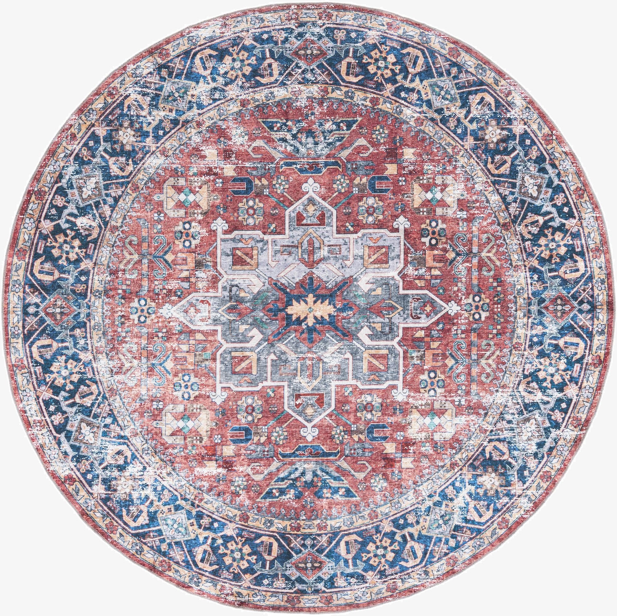 A 7' 10 round orange and red bohemian medallion rug with blue and cream accents, featuring a distressed vintage look.
