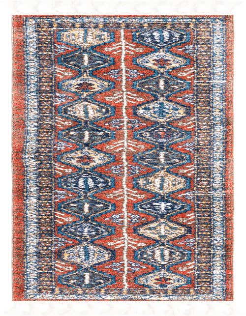 A vibrant 8 ft runner rug with a modern stripe pattern in oranges, reds, and blues, featuring a high pile and decorative tassels.