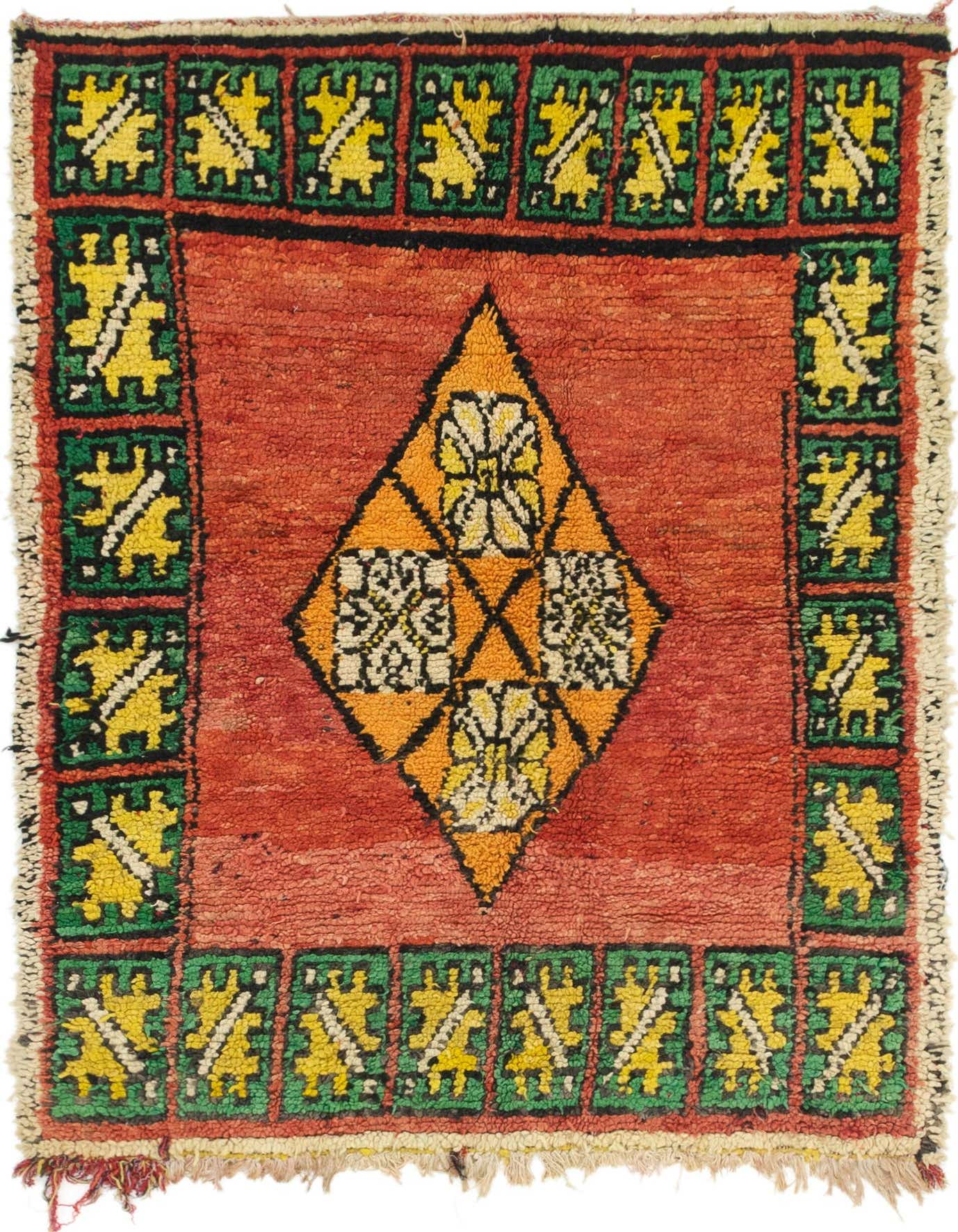 A vibrant 8 ft runner rug with a tribal medallion pattern in oranges, reds, yellow, and green, featuring a shag pile.