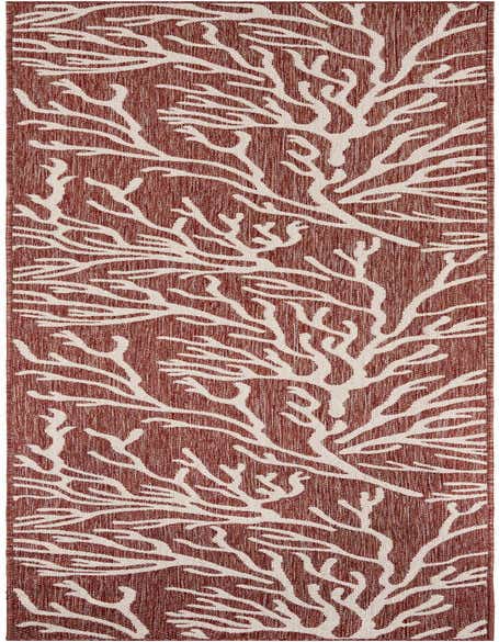 A 12 ft runner rug from the Outdoor Coastal collection by Rugs.com, featuring a vibrant coral pattern in white against a textured terracotta orange background.