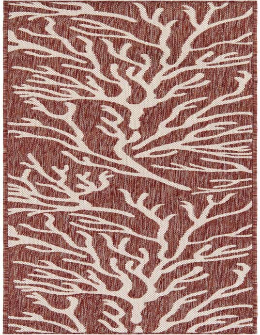 An 8 ft runner rug from the Outdoor Coastal collection featuring a modern, abstract coral pattern in shades of orange and red.