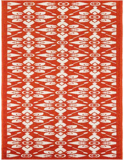 An 8 ft runner rug in a vibrant orange with a repeating modern white floral lattice pattern, suitable for indoor or outdoor use.