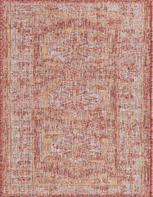 An 8 ft runner rug in shades of orange and red, featuring a subtle Southwestern-inspired traditional pattern, suitable for indoor/outdoor use.