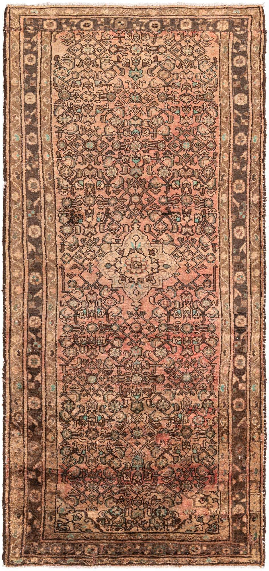 A 9 ft runner rug in a traditional Persian style, featuring a medallion pattern in oranges, reds, and browns with subtle teal accents.