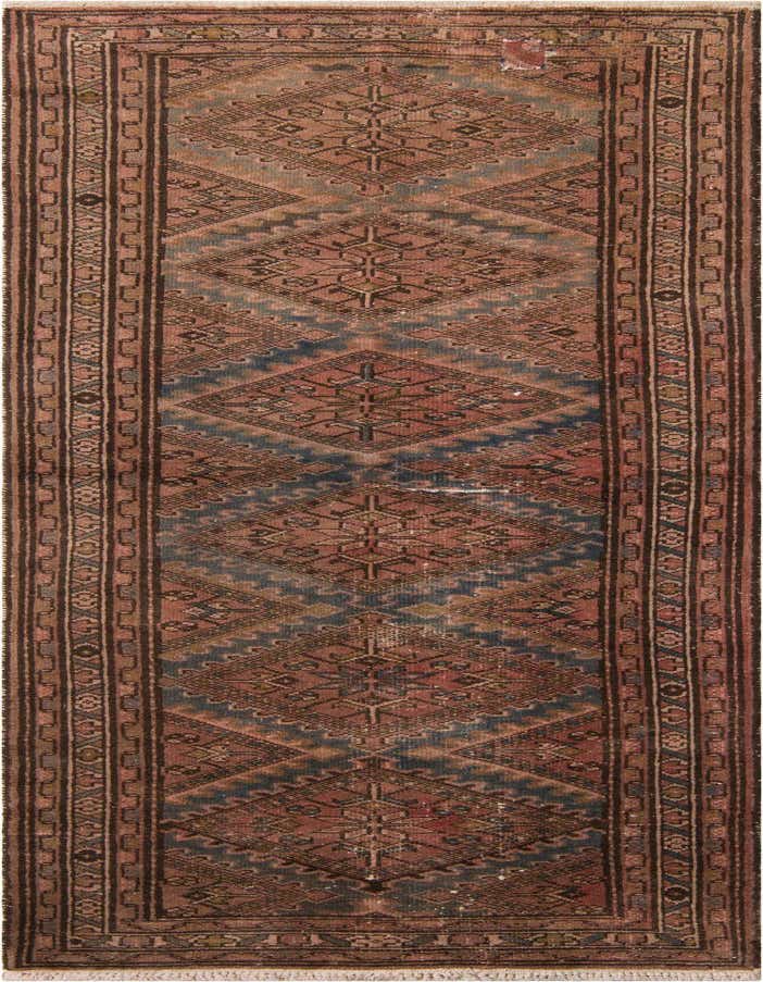 A 10 ft runner rug in a Persian vintage style, featuring a distressed pattern of oranges, reds, and blues, ideal for a hallway.