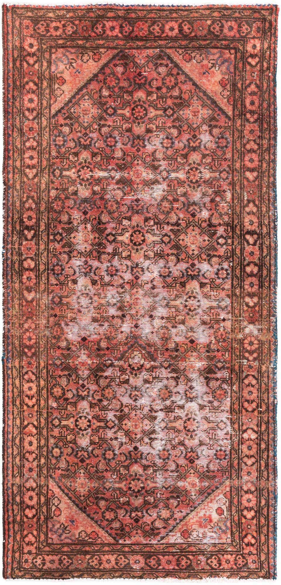 A 7 ft runner rug in a vintage Persian style, featuring faded oranges and reds with intricate floral and geometric patterns, ideal for a hallway.