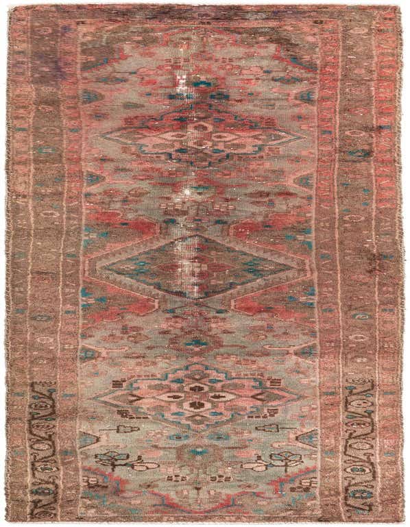 A 9 ft runner rug with a faded Persian medallion pattern in shades of orange, red, and muted teal, ideal for a hallway.