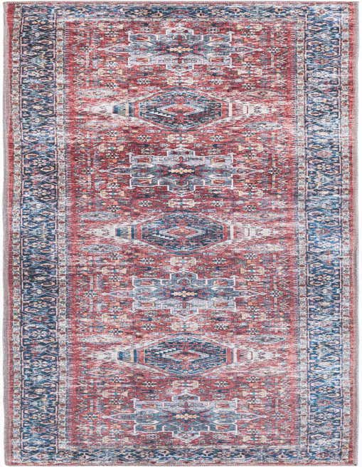 An 8 ft runner rug featuring a distressed bohemian and traditional medallion pattern in shades of orange, red, and blue, perfect for a hallway or kitchen.