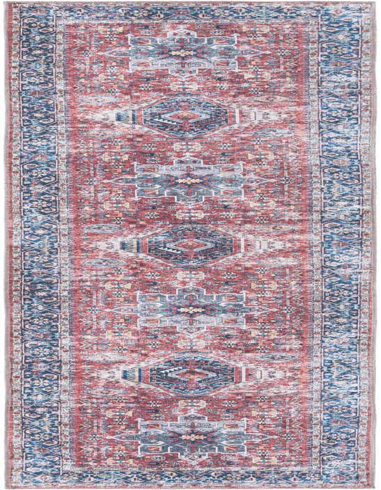 A 10 ft runner rug with a distressed Bohemian medallion pattern in shades of orange, red, and blue, ideal for a hallway.