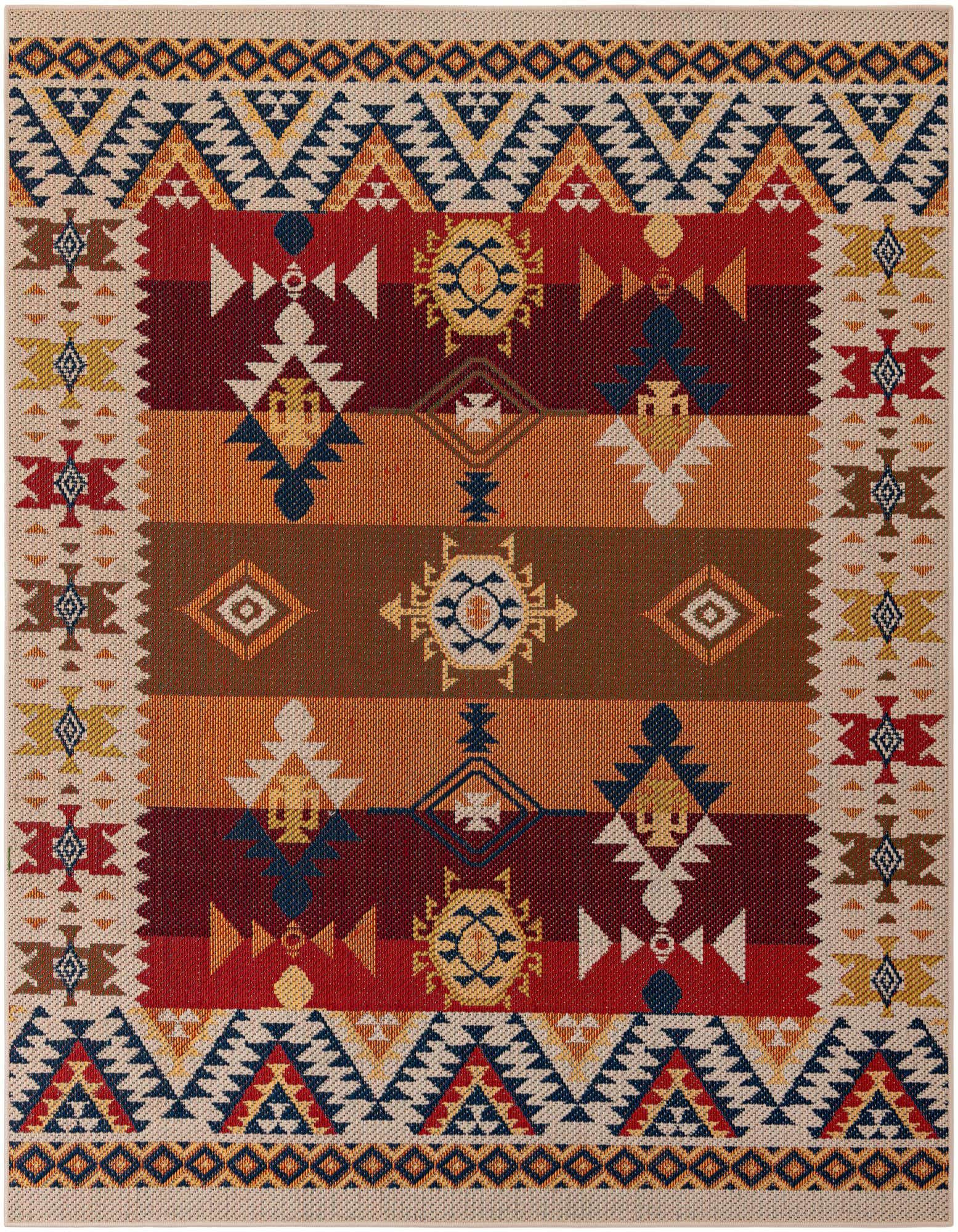A square Baja Outdoor rug with a vibrant Southwestern pattern in oranges, reds, blues, and creams, suitable for a patio.