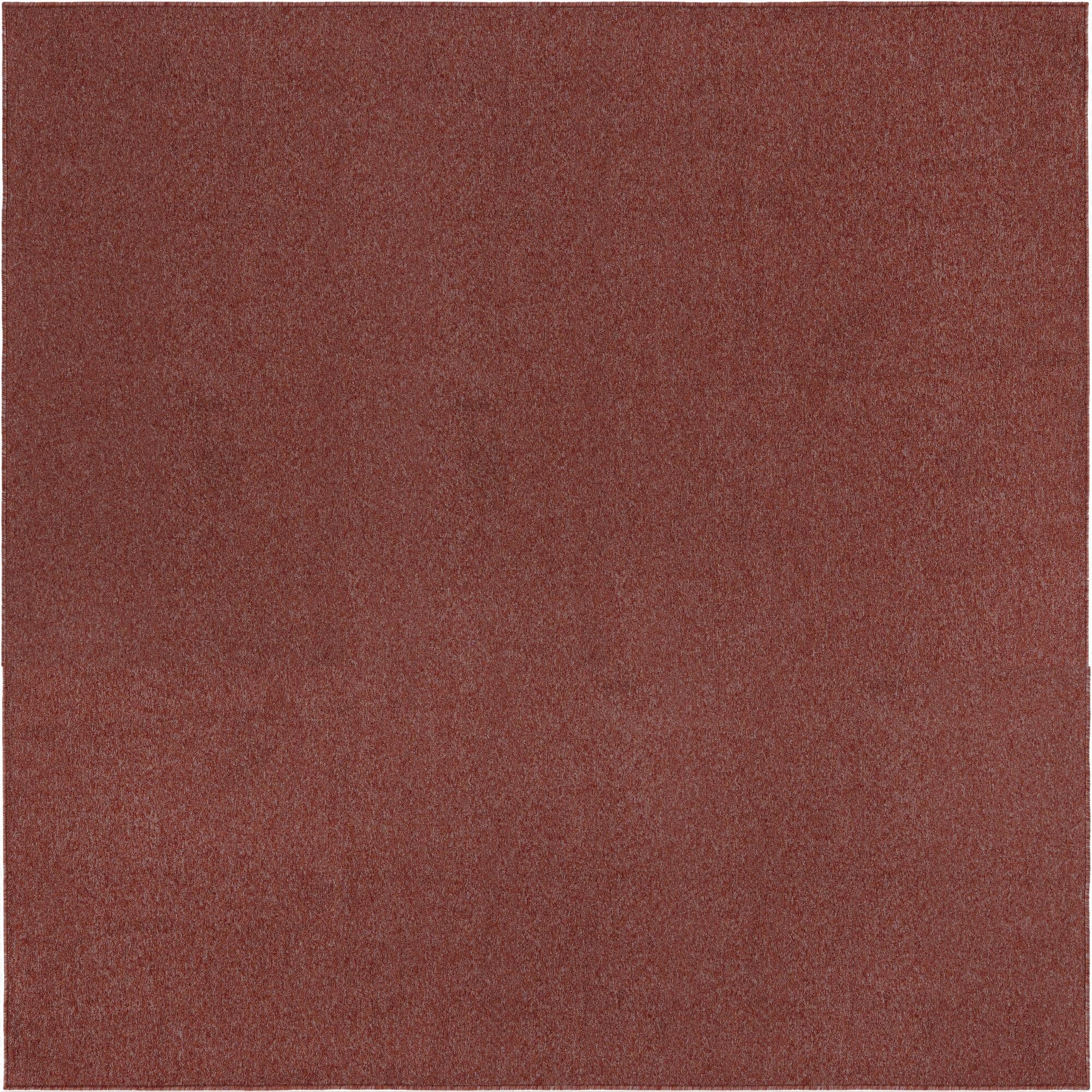 A 9' 10 x 9' 10 square modern solid area rug in a blend of orange and red tones, suitable for indoor use.