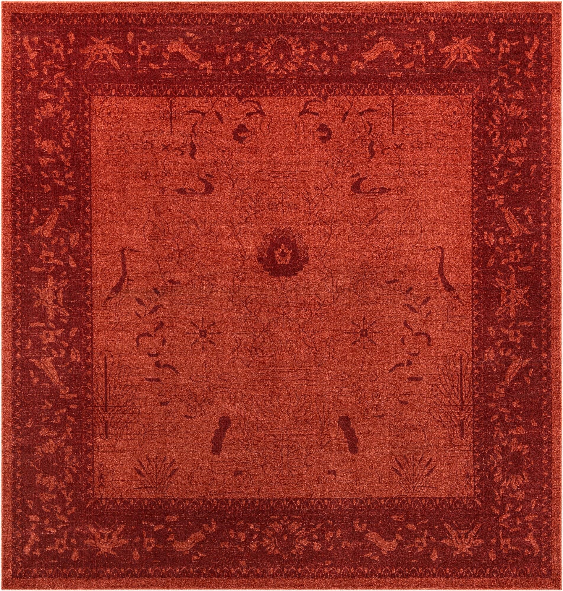 A 10'x10' square orange traditional area rug with a subtle botanical and floral pattern and a darker red ornate border.