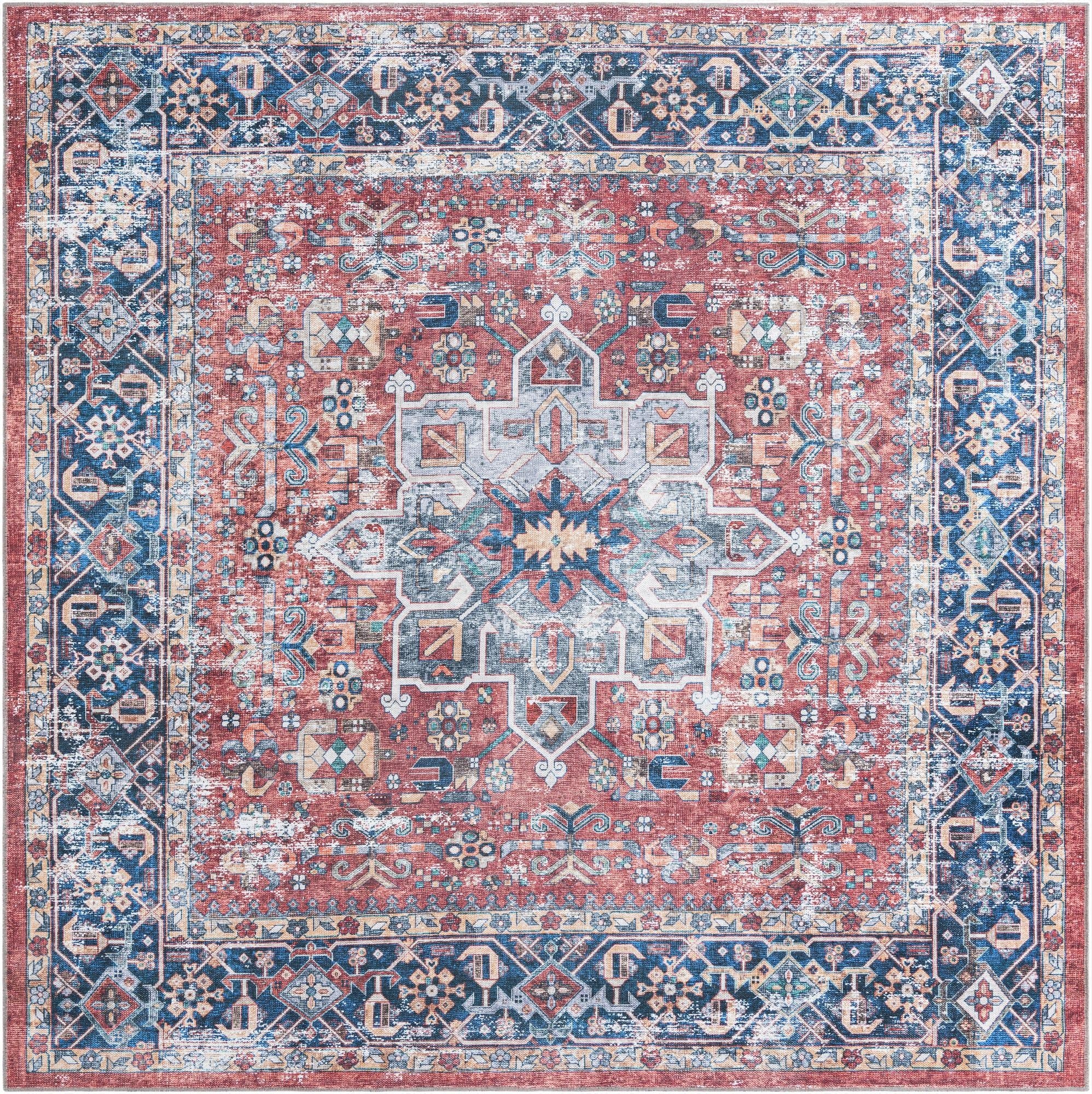 A square 7' 10 x 7' 10 Rugs.com Yara rug featuring a distressed bohemian medallion pattern in oranges, reds, and blues.