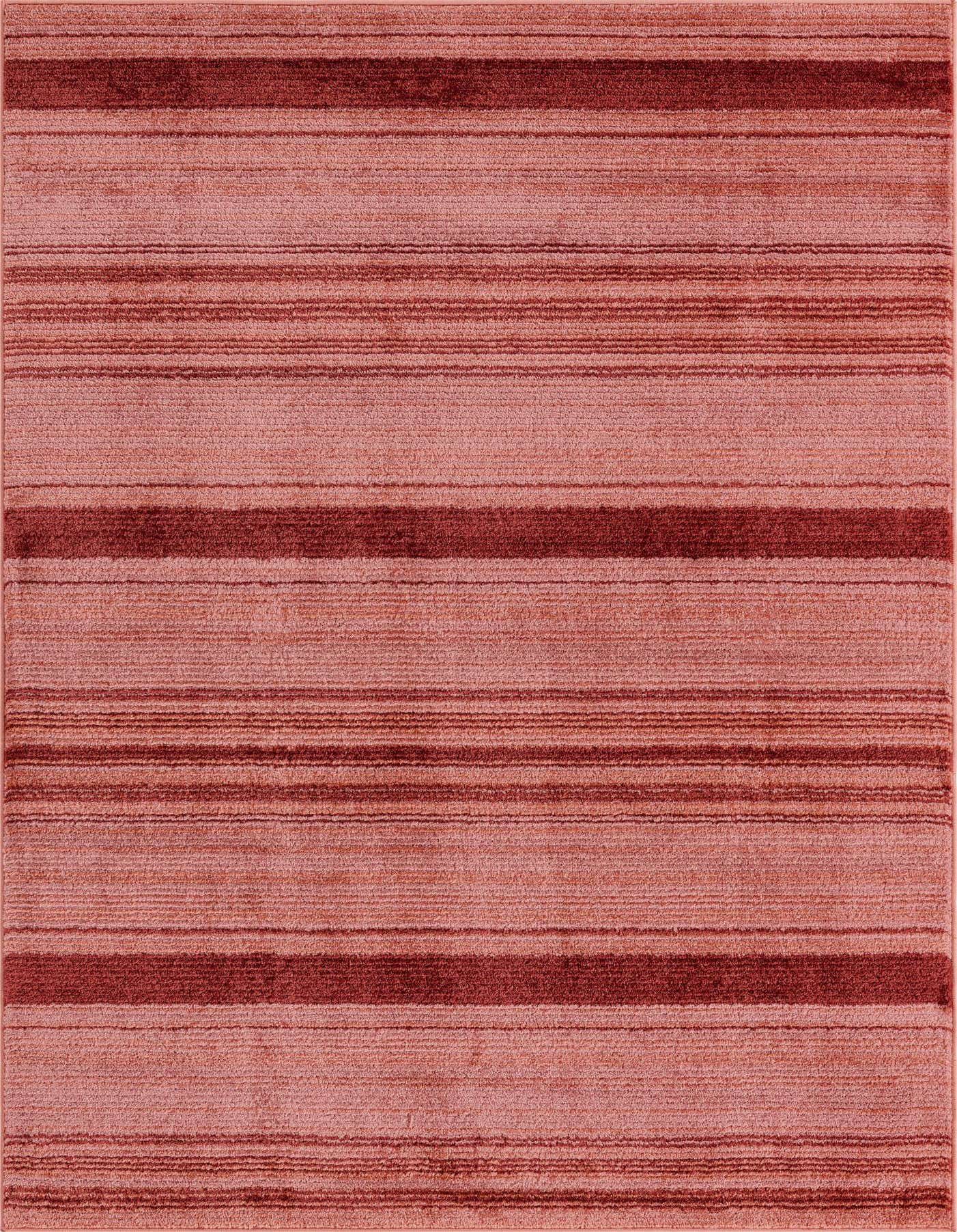 A 5x8 rectangular Rugs.com Gemstone rug featuring varying shades of pink and red horizontal stripes, with a textured pile.