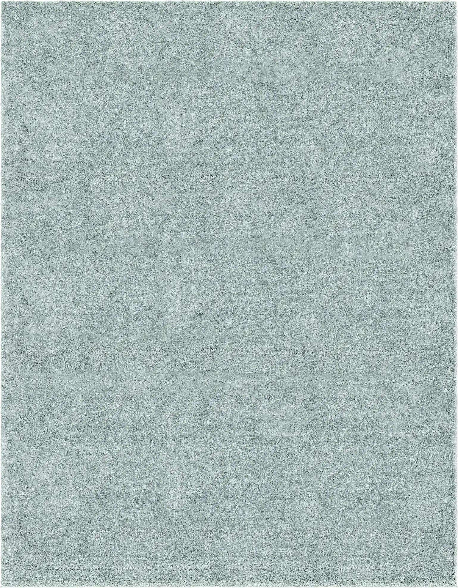 A 10x13 rectangular green shag rug with a textured, solid color pile, ideal for a living room.