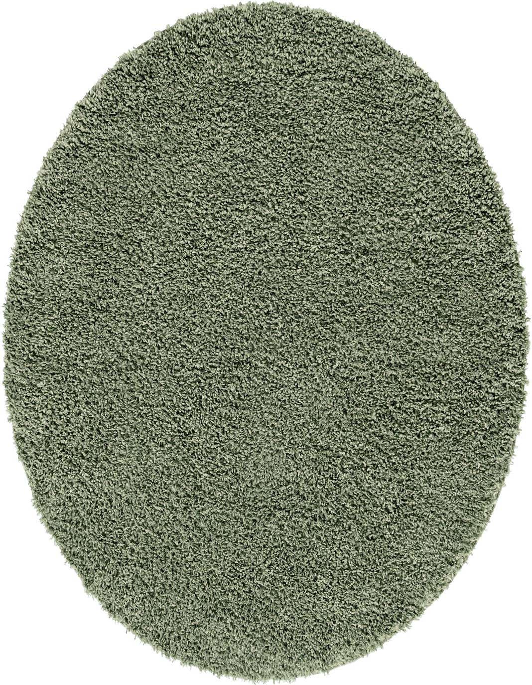 A soft, plush 4' round shag rug in a muted sage green color, offering a cozy texture.