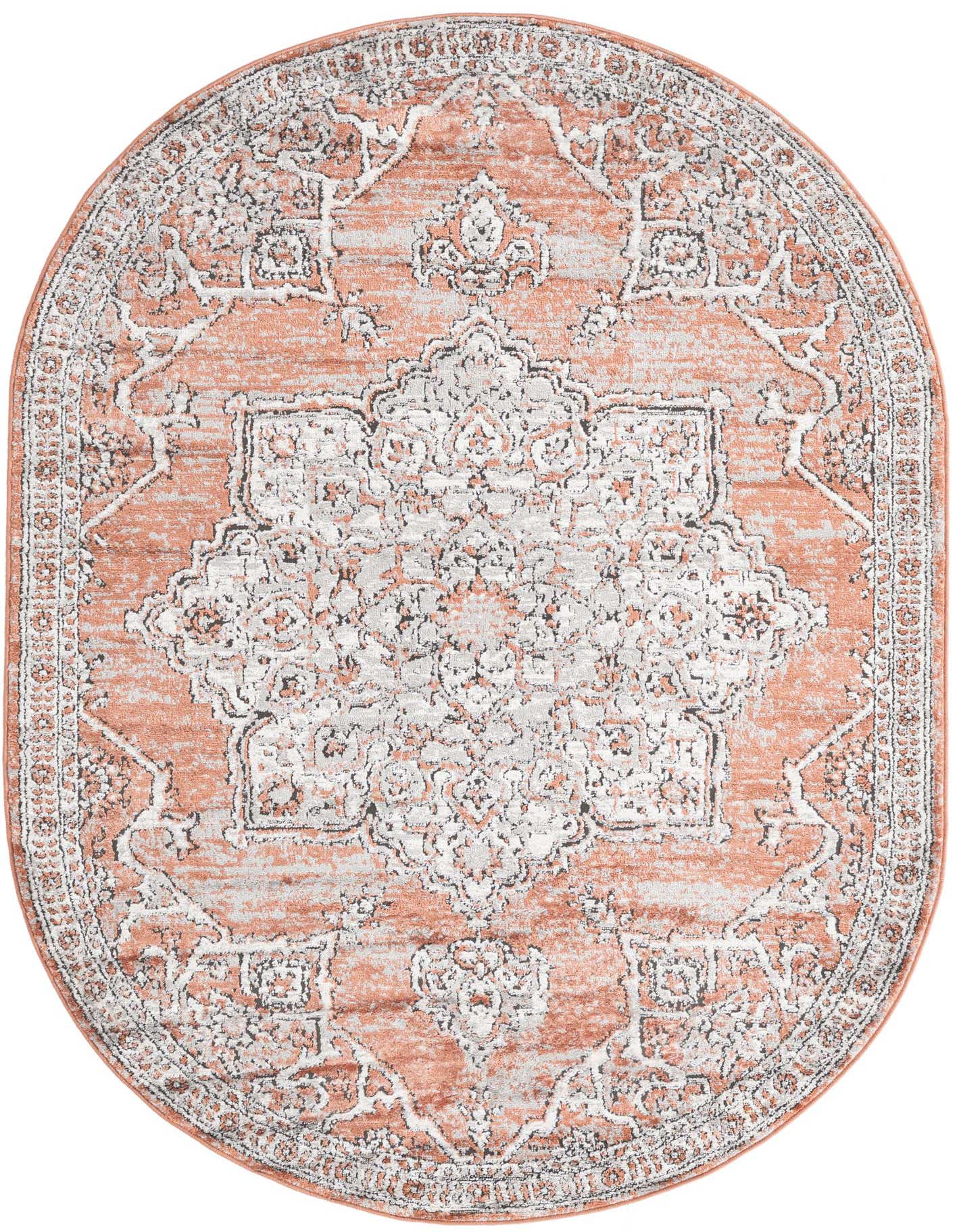 An oval 5' 3 x 8' 0 orange and pink traditional medallion rug with a textured, high pile.