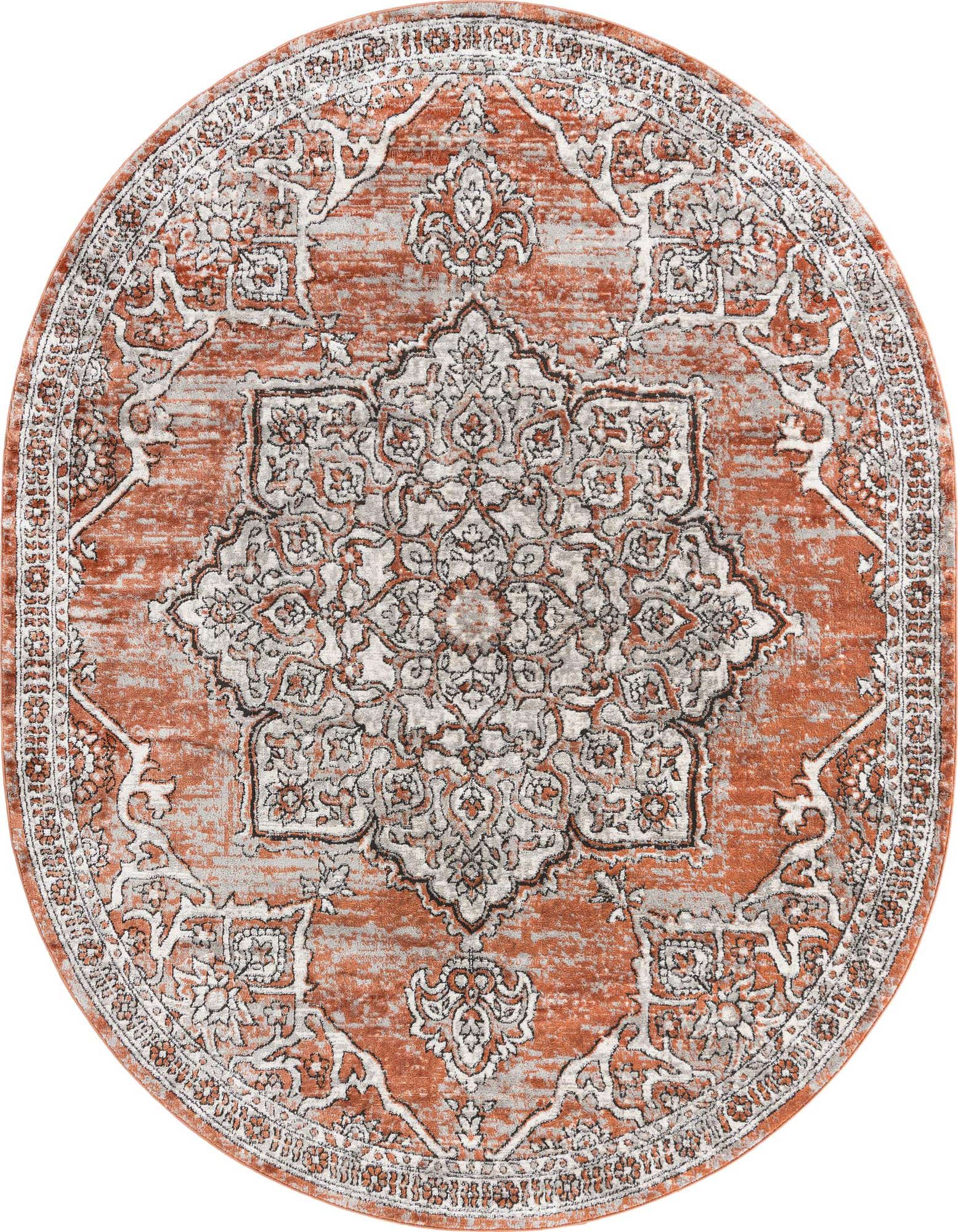 An oval 7' 10 x 10' 0 orange and pink traditional medallion rug with a vintage, distressed look.