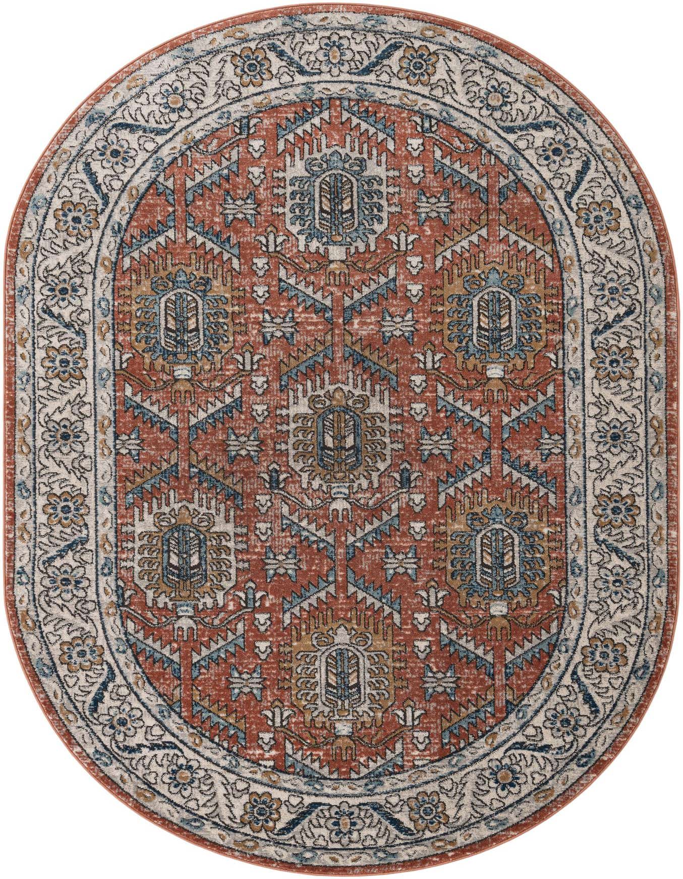 An oval 6' x 9' orange and pink polypropylene rug with a distressed traditional pattern and a light floral border.