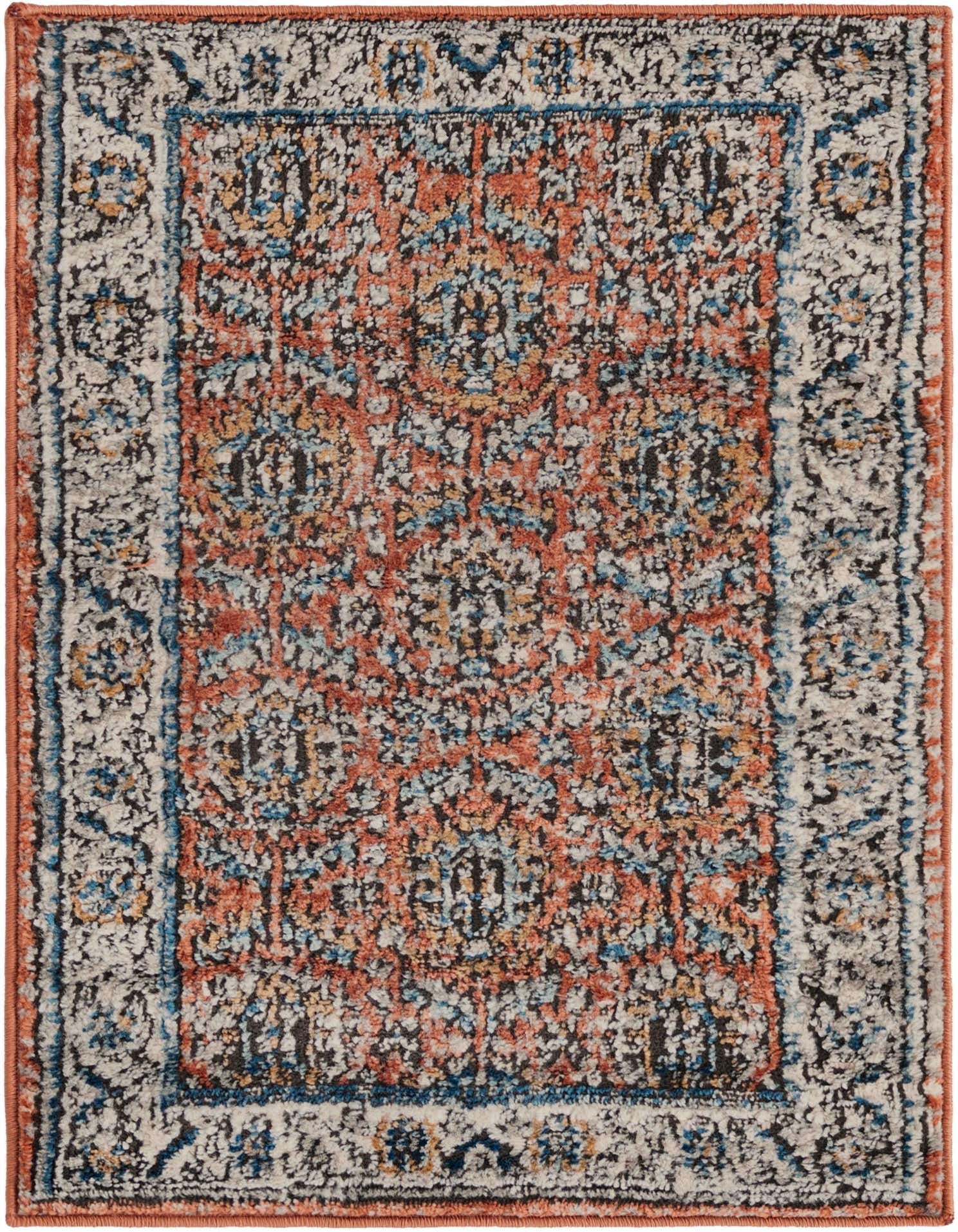 A 2x3 rectangular Nyla rug featuring a distressed traditional medallion pattern in shades of orange, pink, blue, and cream.