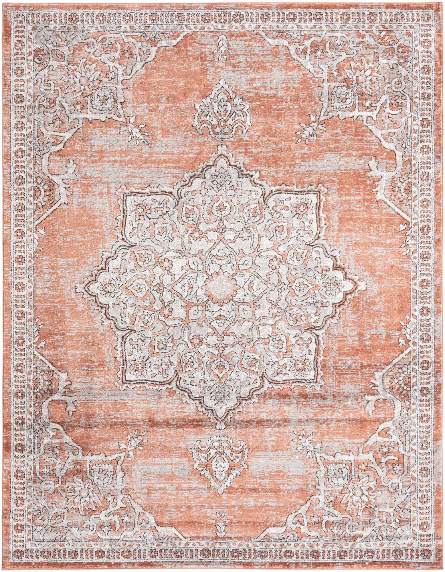 A 9x12 rectangular Nyla rug featuring a distressed orange and pink background with a large white traditional medallion pattern.