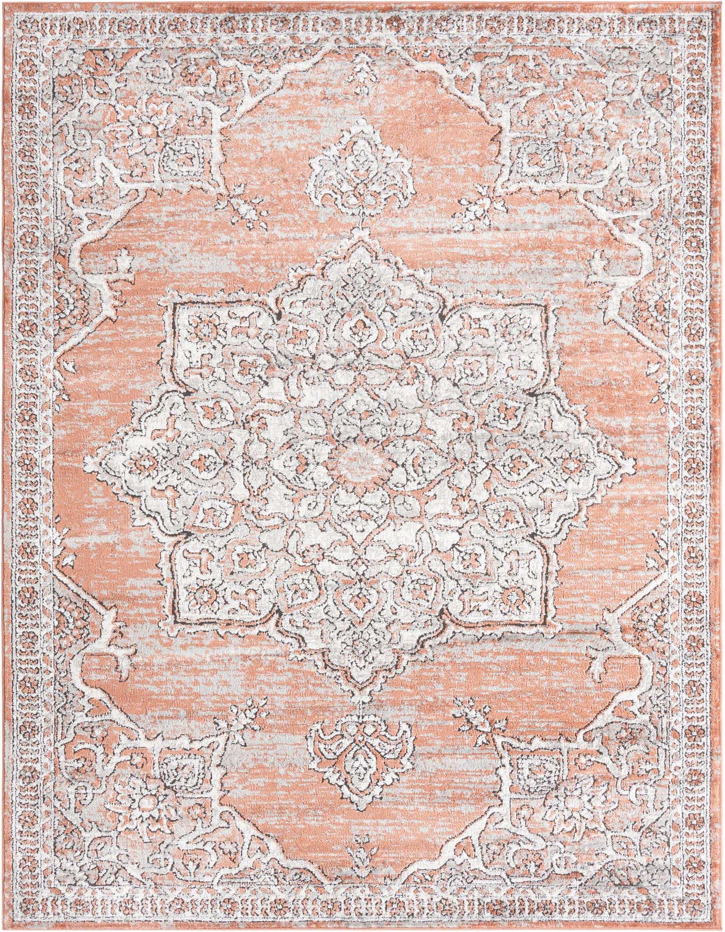 A 6x9 rectangular Nyla rug featuring a distressed traditional medallion pattern in shades of orange, pink, and white.
