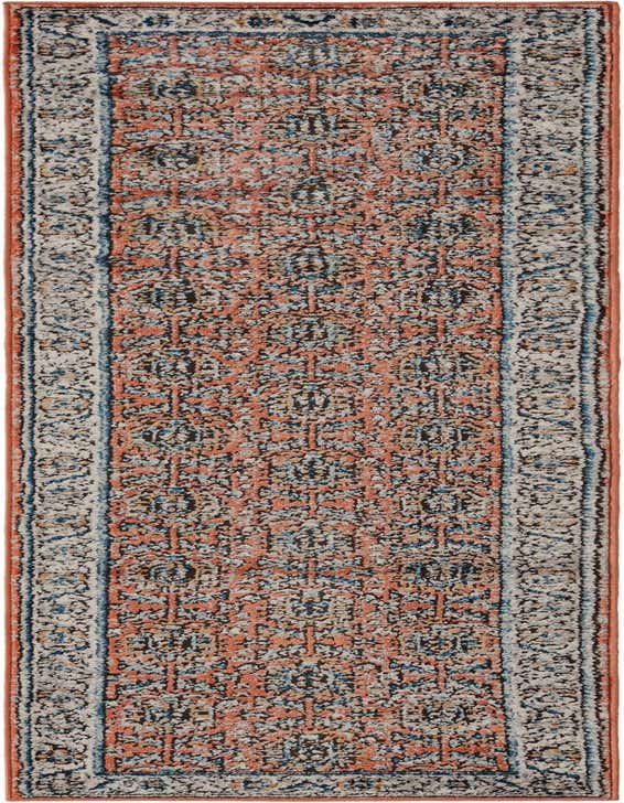 An 8 ft runner rug from the Nyla collection, featuring a distressed traditional medallion pattern in shades of orange, pink, blue, and cream, ideal for a hallway.