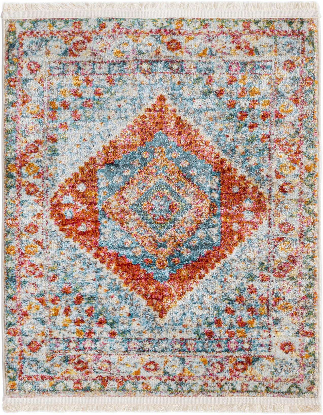 A 2x3 rectangular Rugs.com Paragon rug featuring a distressed Southwestern medallion pattern in oranges, pinks, and light blues with fringe.
