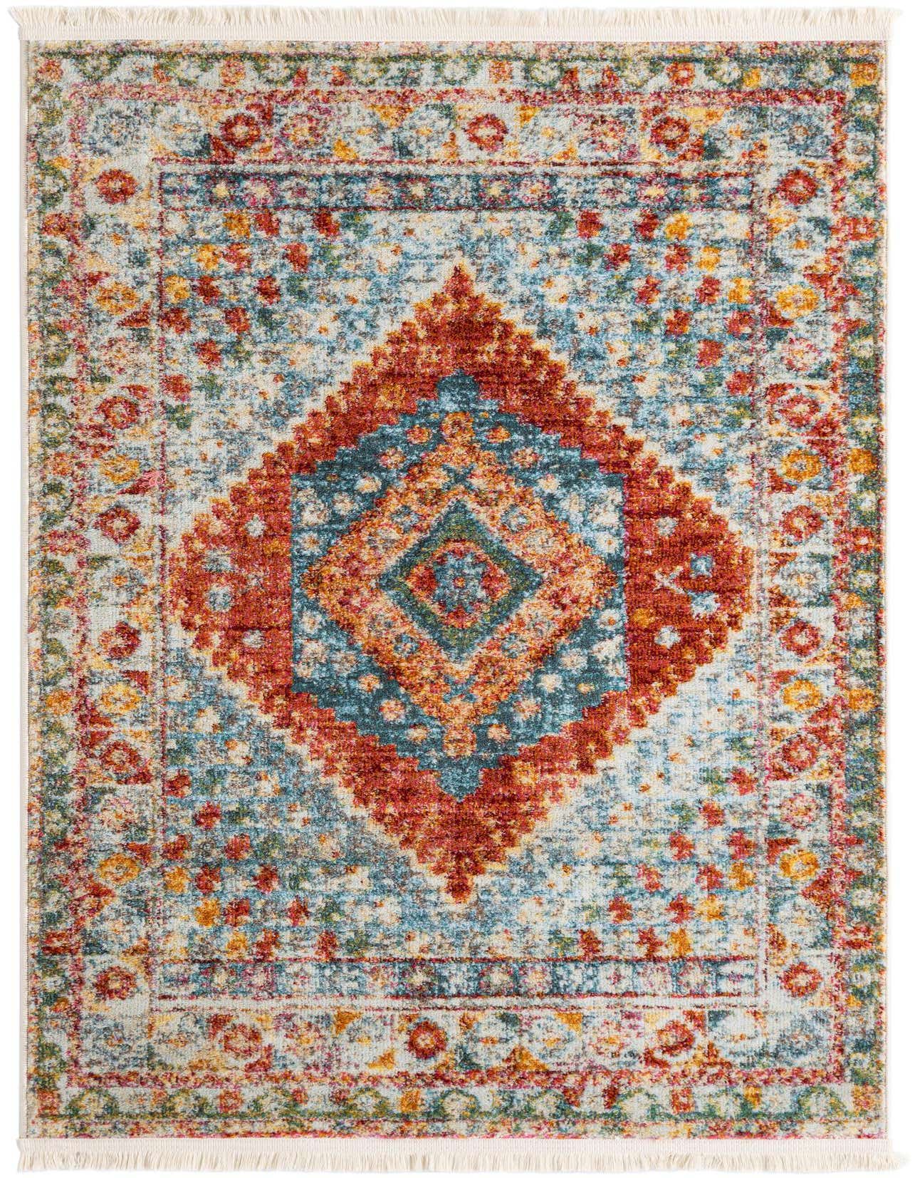 A 3x5 rectangular Rugs.com Paragon rug with a Southwestern medallion pattern in oranges, pinks, and blues, featuring a vintage distressed look.