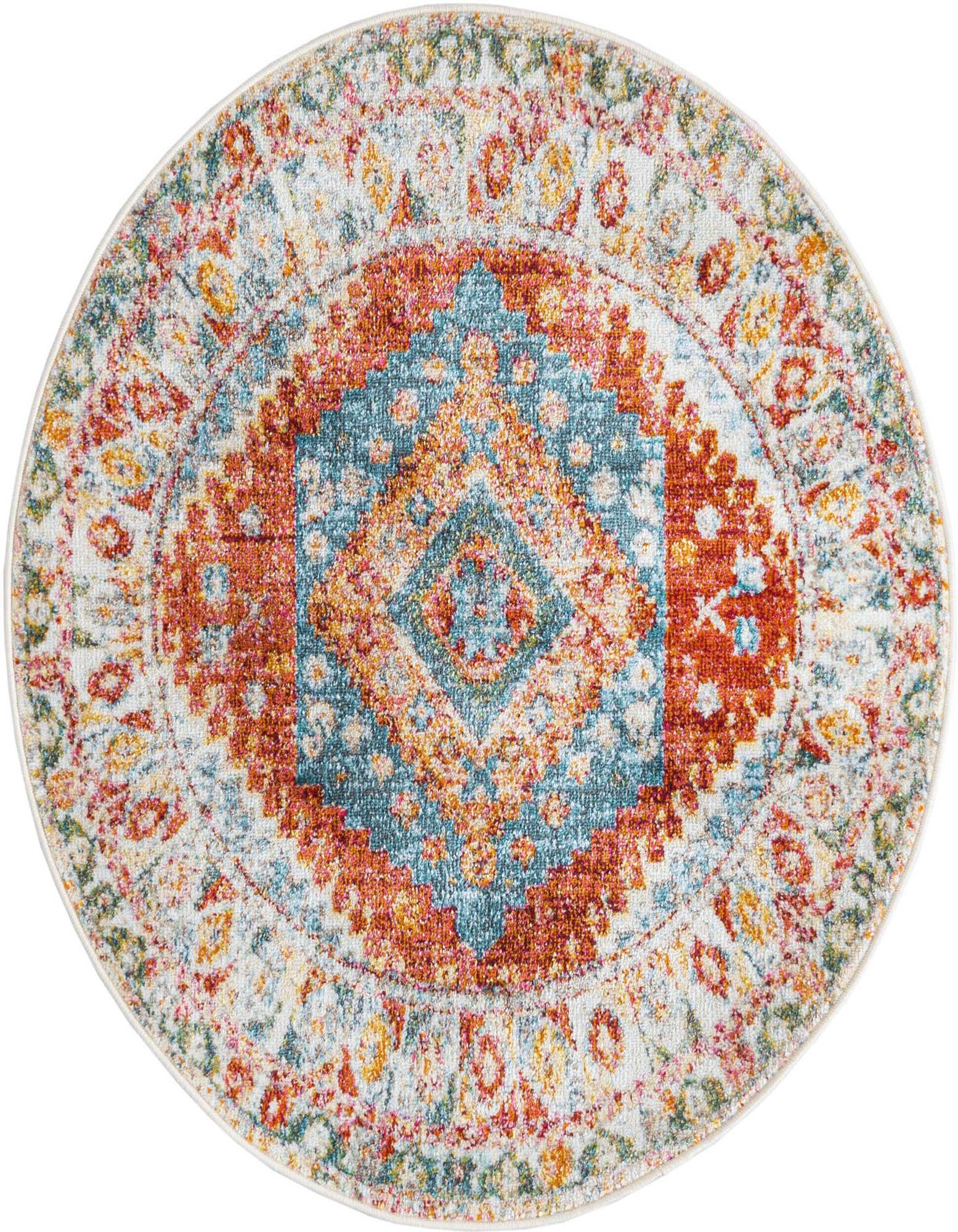A round Southwestern medallion rug featuring a vibrant mix of oranges, pinks, and blues on a light background.