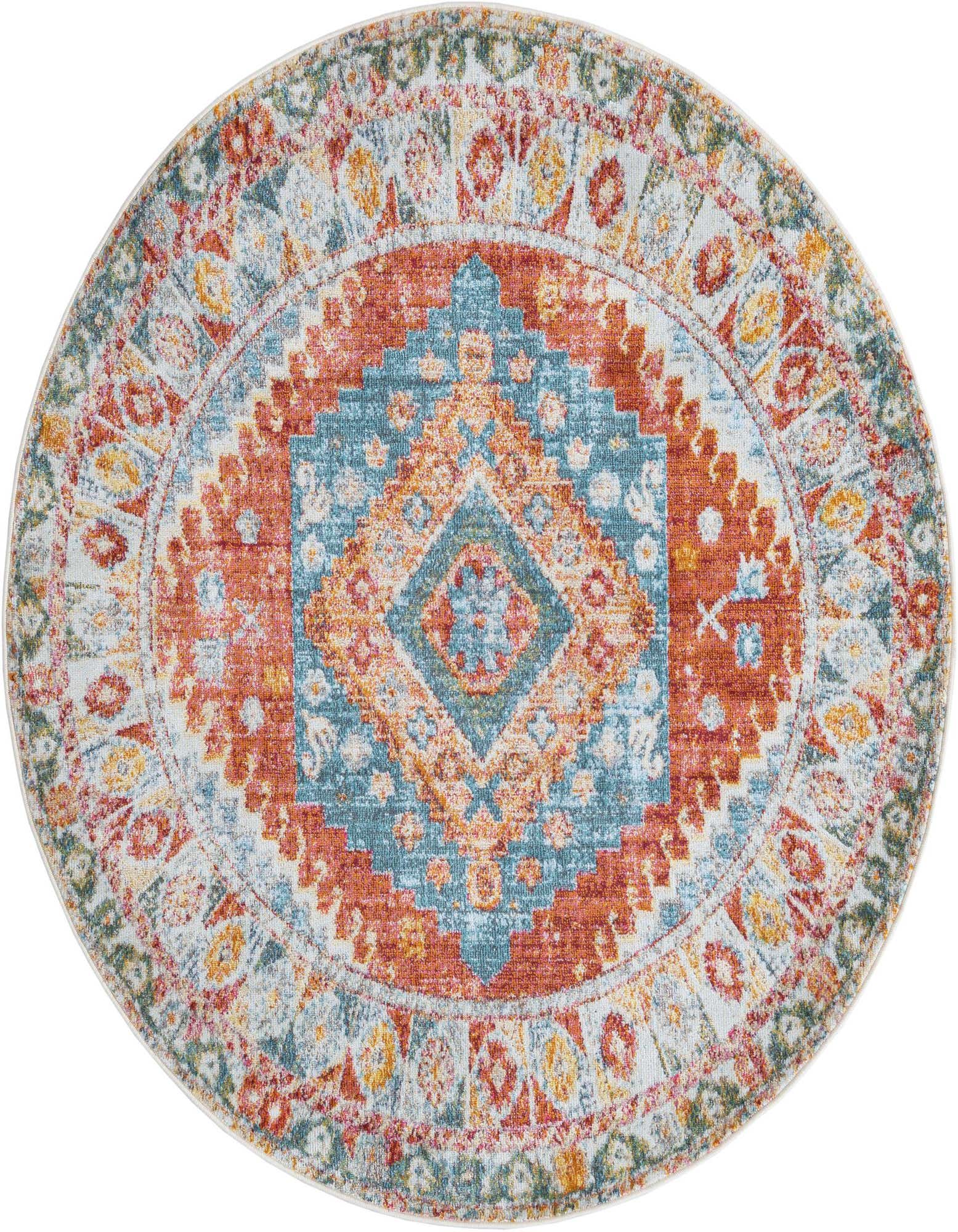 A 5' 5 round Southwestern medallion rug in oranges, pinks, and blues, featuring a traditional tribal pattern.