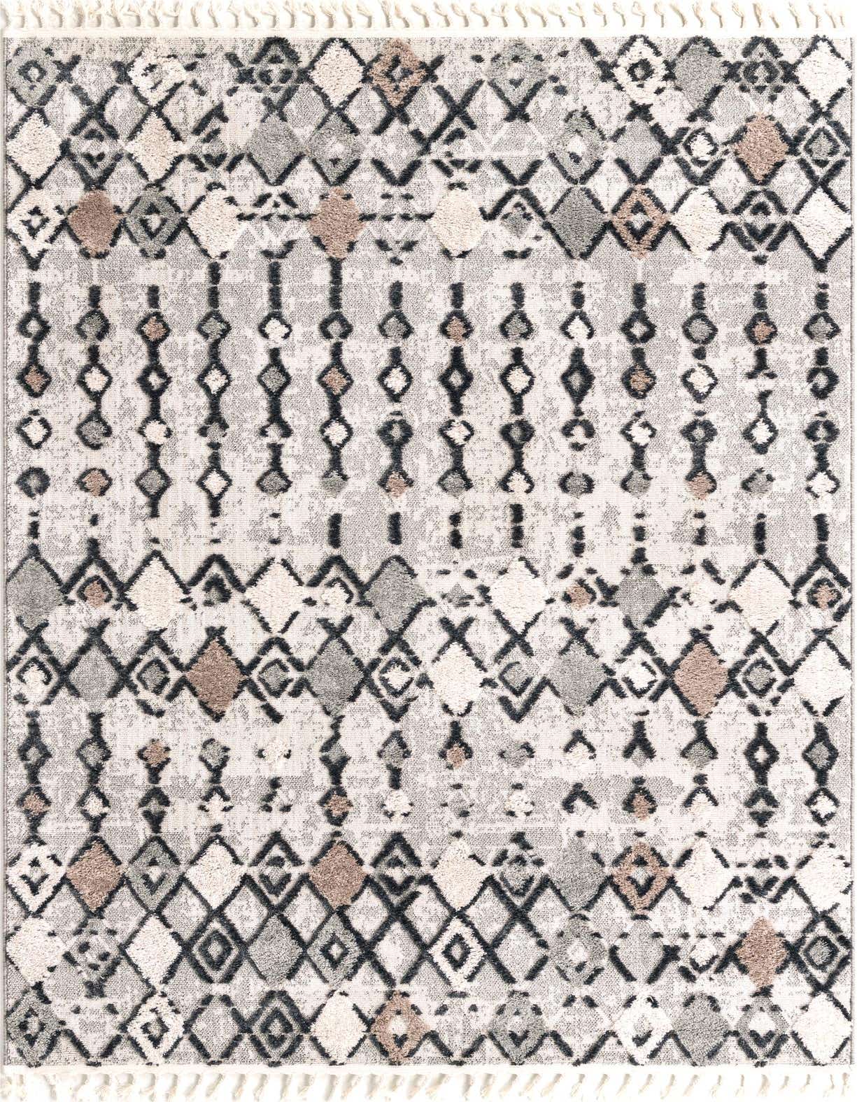A 6x9 rectangular Rugs.com Cherokee rug featuring a modern tribal pattern in browns, creams, and grays with a textured pile and fringe.