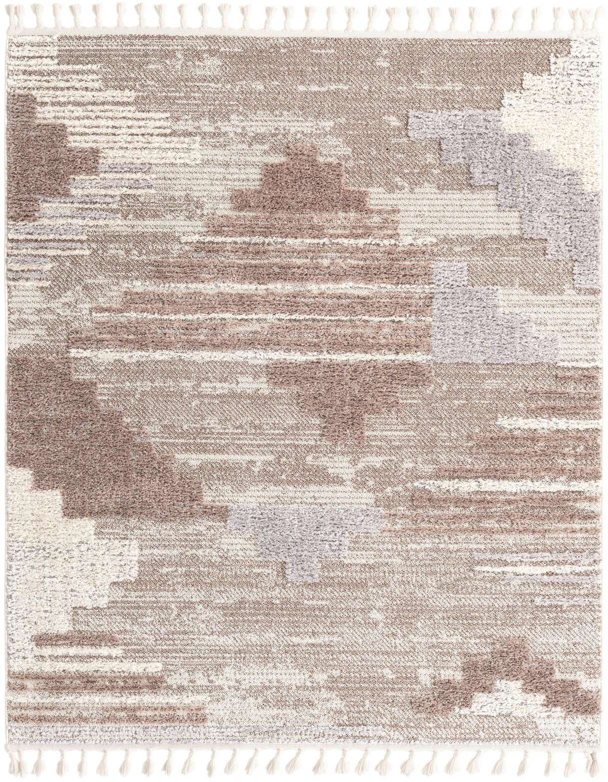 A 5x8 rectangular indoor rug with a modern tribal abstract pattern in browns, tans, ivories, and creams, featuring a textured pile and decorative tassels.