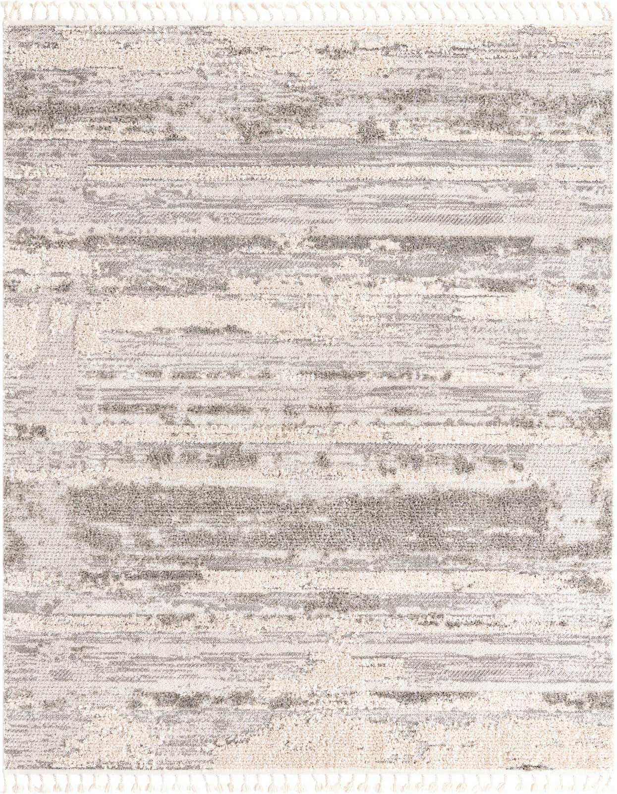 A 6x9 rectangular Rugs.com Cherokee rug featuring an abstract tribal pattern in browns, tans, ivories, and creams with a textured pile.