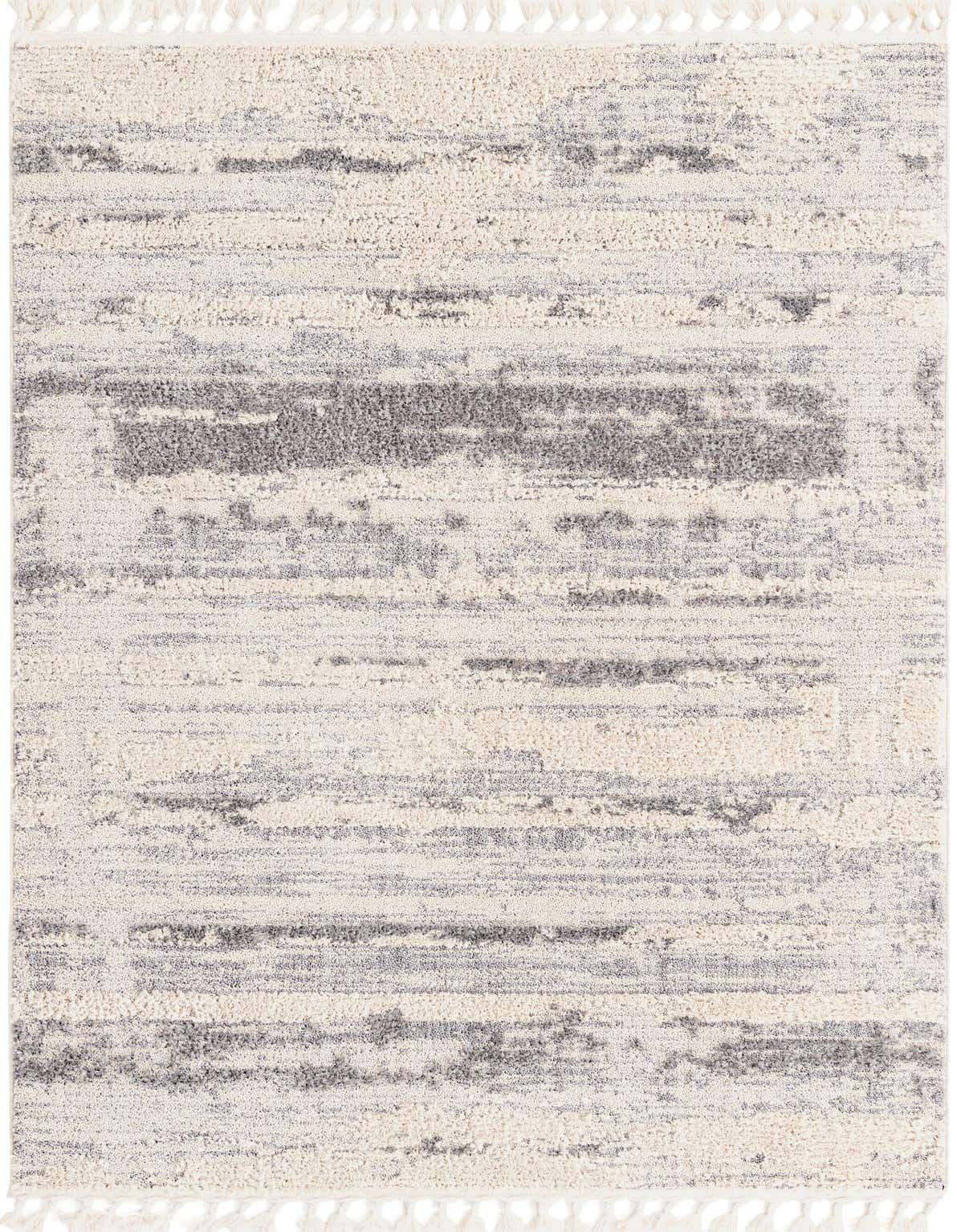 A 5x8 rectangular area rug featuring an abstract tribal pattern in shades of brown, tan, and cream with textured pile and decorative tassels.