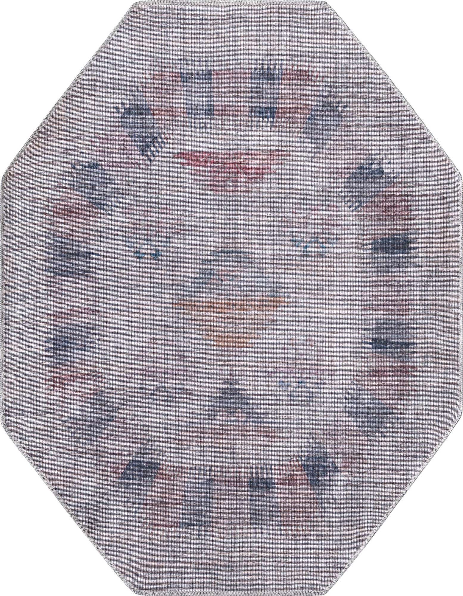 An octagon-shaped Sisu rug, 5' 3 x 5' 3, featuring a faded Southwestern tribal pattern in ivories, creams, and subtle blues and reds.