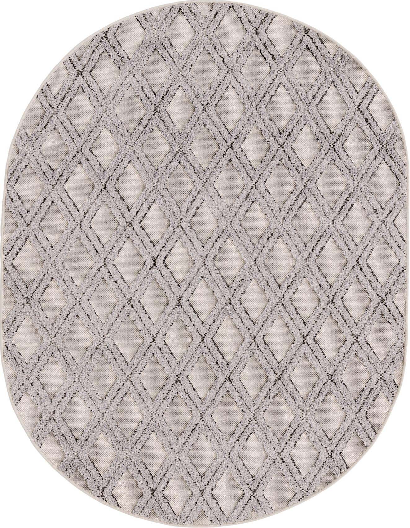 An oval ivory and cream rug with a modern abstract diamond pattern and textured high-low pile.