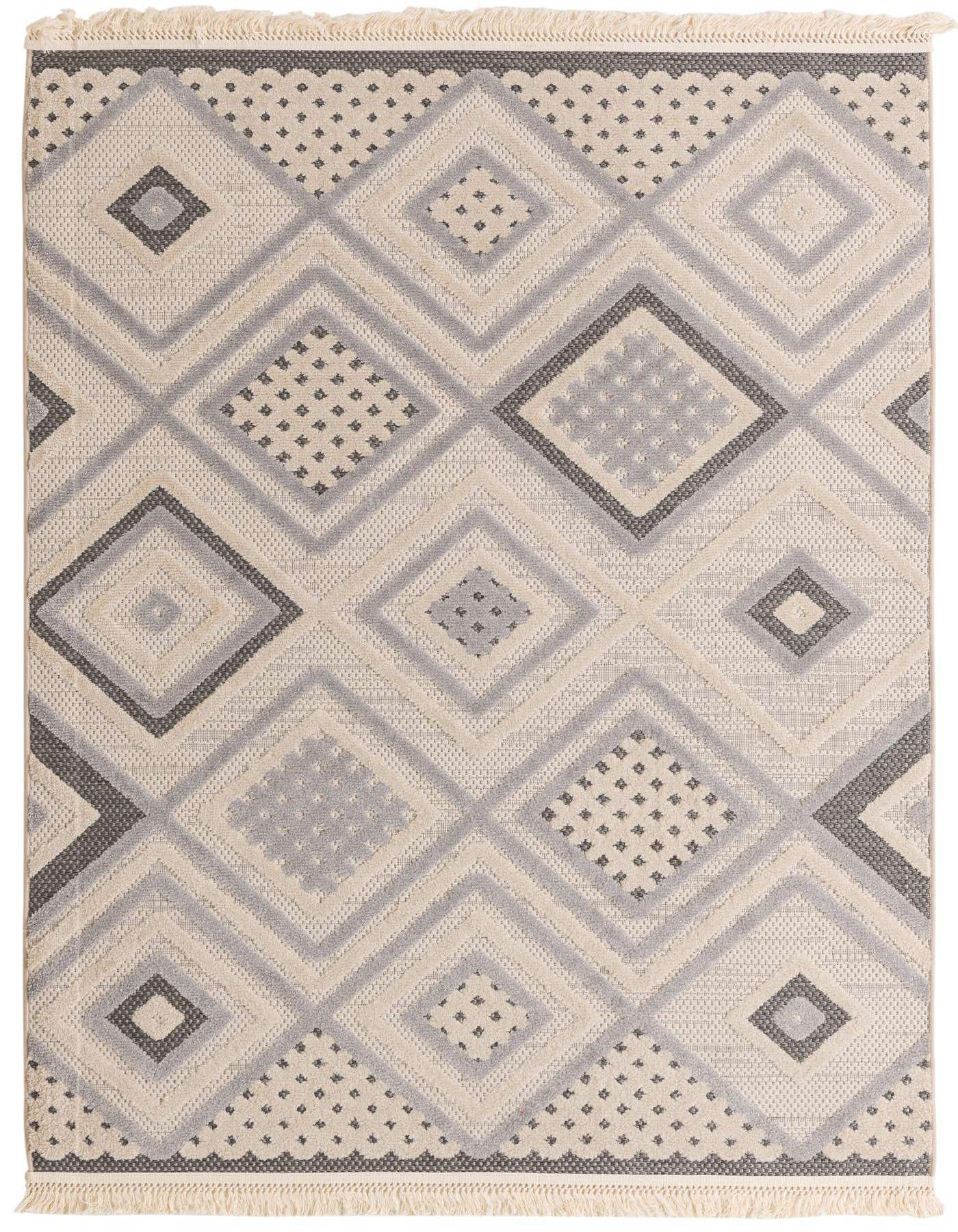 A 5x8 rectangular Arlo rug featuring a modern abstract pattern of ivory, cream, and gray diamonds with textured details and fringed ends.