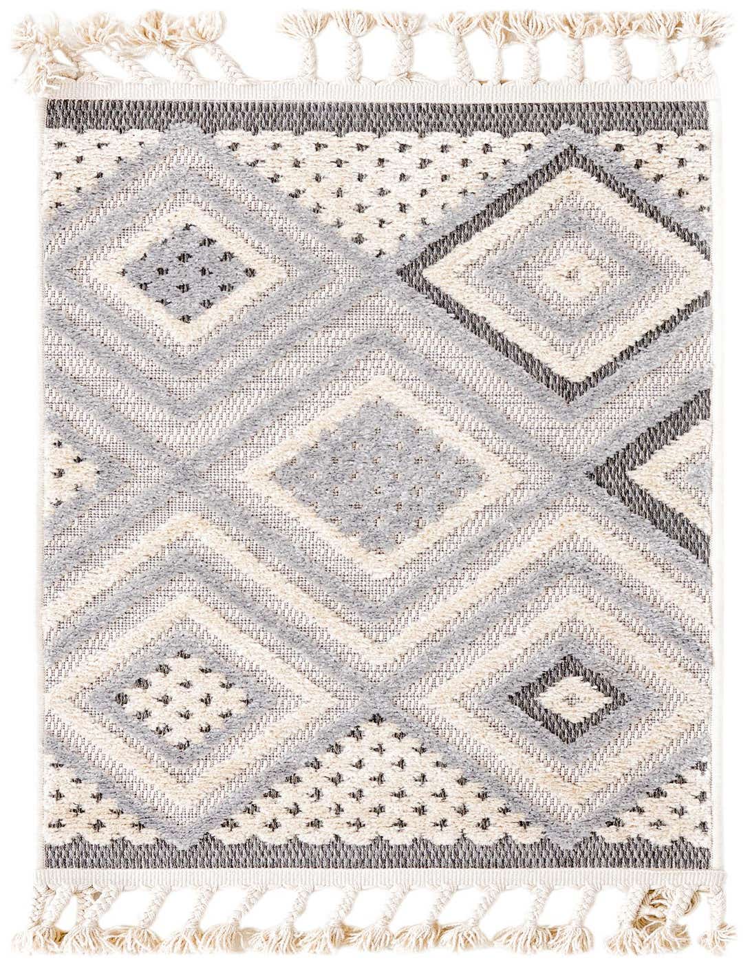 A 2x3 rectangular Arlo rug featuring a modern transitional geometric diamond pattern in ivory, cream, and gray with textured high-low pile and decorative tassels.