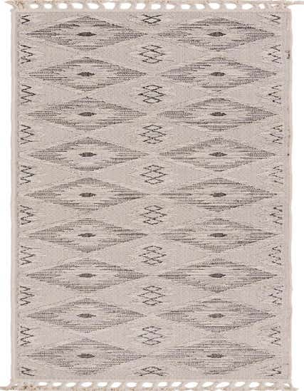 A 12 ft Arlo runner rug in ivory and cream with a modern Southwestern tribal pattern and textured high/low pile.