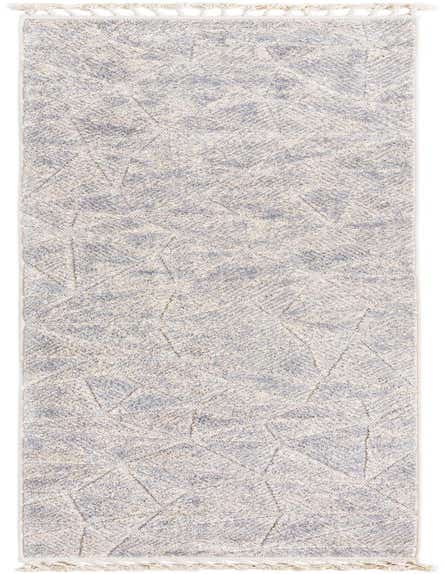 A 12 ft runner rug from the Rugs.com Arlo Collection, featuring an ivory and cream modern geometric pattern with a high/low textured pile and decorative tassels.